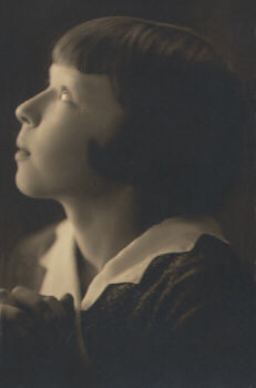A young girl in prayer